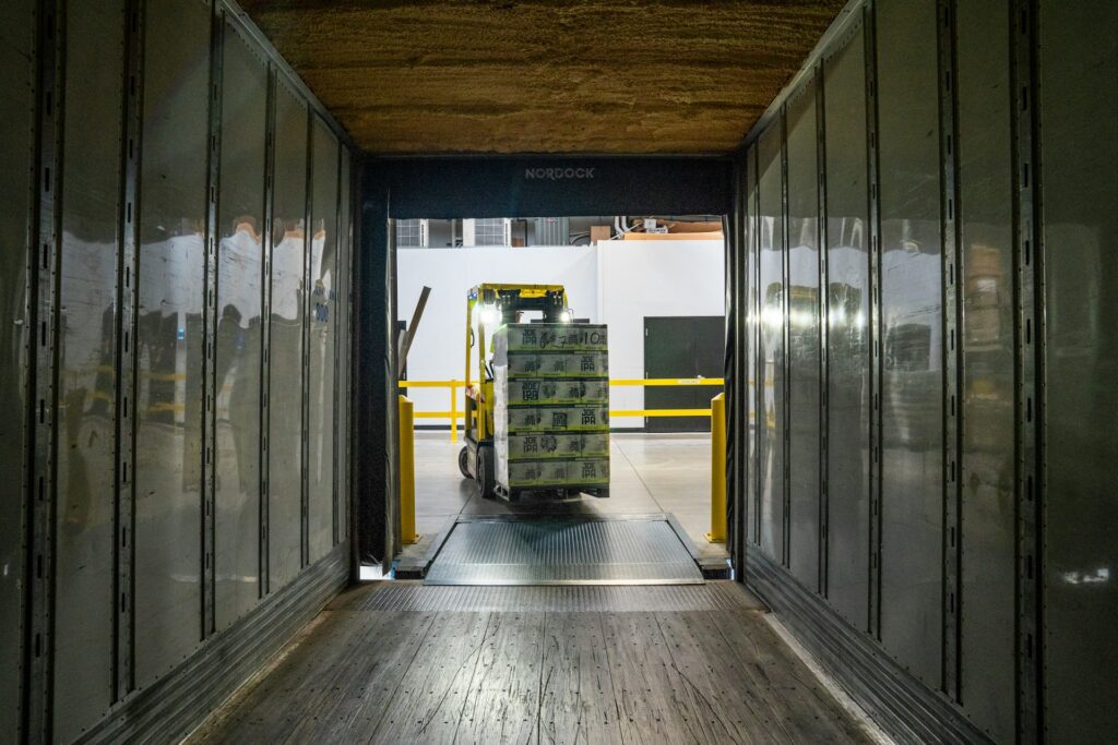 Forklift carrying goods in a warehouse