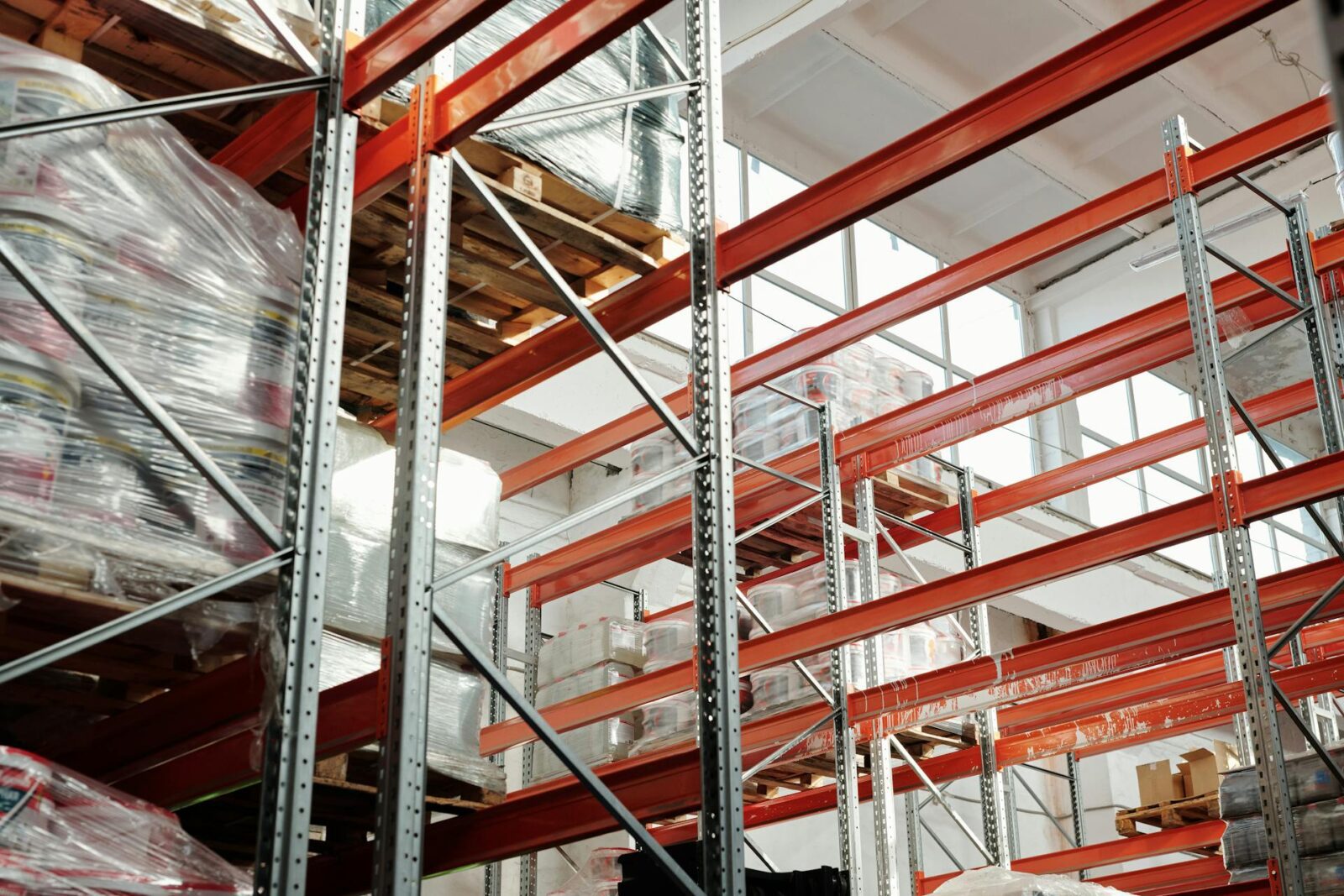 Wrapped wares on pallets in a warehouse